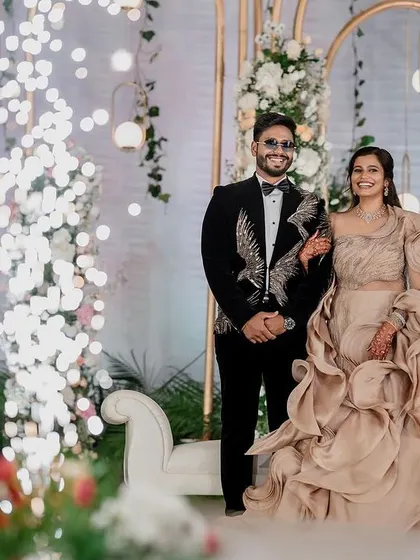A stylish reception look. We love capturing the glamour and fun of the evening party, from the designer outfits to the happy, candid interactions.