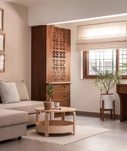 The transformed study, where a balcony was enclosed to create a more spacious and light-filled home office. Glass sliding doors now connect the study to the rest of the home.