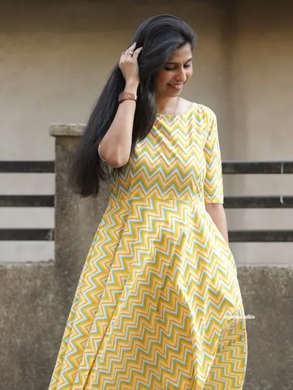 Soak up the sunshine in our airy summer palazzo set. This yellow chevron print is light, stylish, and made for comfort.