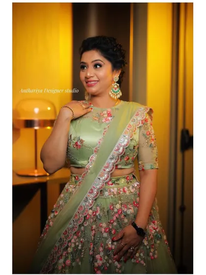 A duplicate of image 81, capturing the elegance of the pastel green lehenga.