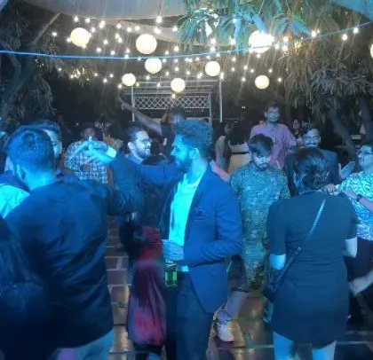 Another shot of the happy couple and their guests dancing the night away.