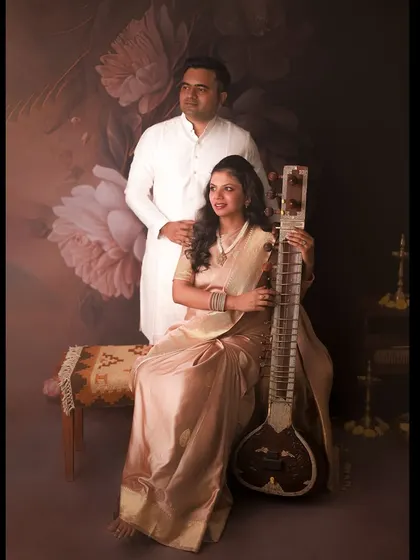 We incorporated her love for music into this traditional shoot by including her sitar. It adds such a personal and unique layer to their story.