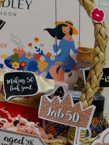 Another detail shot of the 50th birthday hamper, focusing on the "Fab 50" crown cutout and the beautifully illustrated gift box.