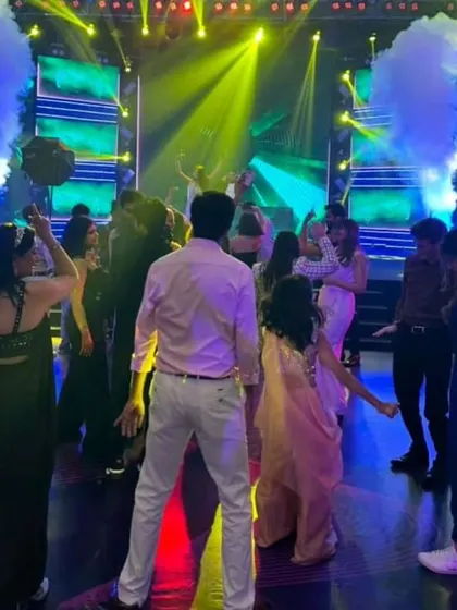 CO2 jets firing on the dance floor add a huge burst of energy. It's a fantastic special effect for making a sangeet or reception feel like a major concert.