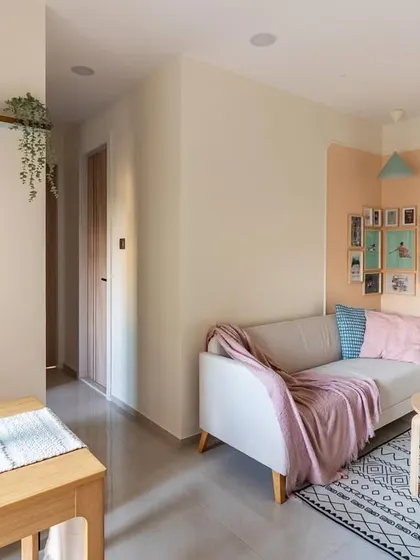 Another view of the budget-friendly living space, showing the clean lines and simple layout that contribute to a feeling of openness.