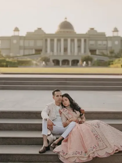 A quiet, romantic moment on the steps of a modern palace in Udaipur. The soft light and grand setting make for a truly memorable pre-wedding photograph.