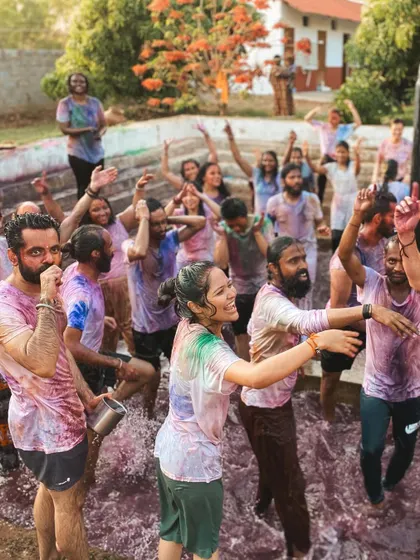 A full-on water and color fight during our Holi celebration. It's a beautiful chaos that washes away worries and leaves everyone smiling and refreshed.