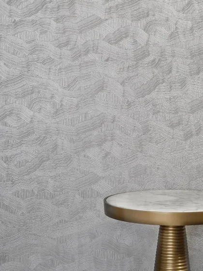 The 'Vinyl Soirée' wallcovering captures the enchantment of an elegant evening. Its flowing textures and rich dimensional hues exude luxury, combining enduring performance with accessible sophistication.