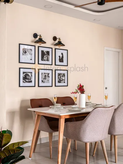 We love creating personal touches, like this gallery wall of family photos in the dining area. It turns a simple wall into a meaningful display of cherished memories.