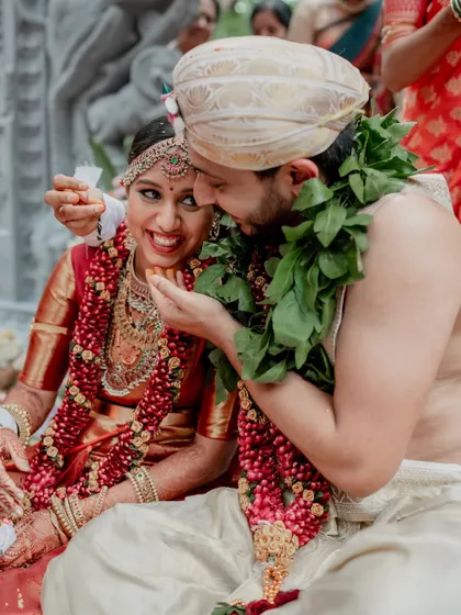A moment of quiet connection amidst the grandeur of The Tamarind Tree. We love using the venue's stunning architecture to frame our couples, creating a story of romance and tradition.