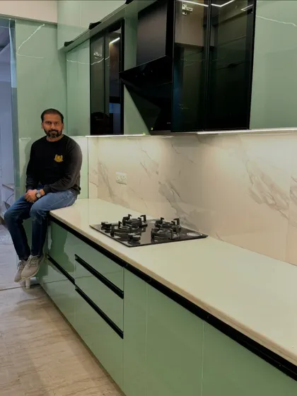 Taking a moment to inspect the countertop and finish. Quality and attention to detail are things I never compromise on.