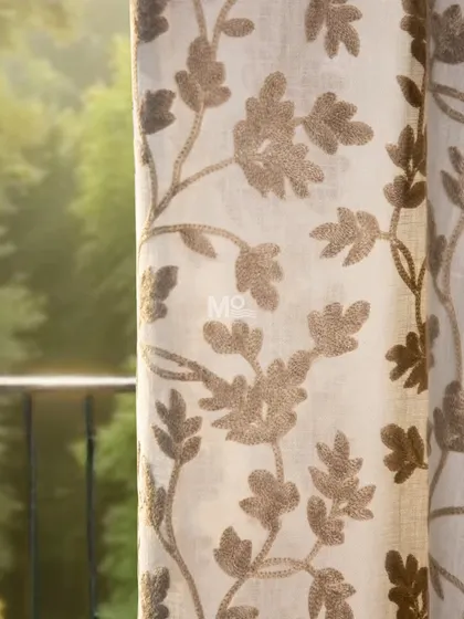A detailed shot of our linen curtain fabric with satin-embroidered chintz florals. The design exudes timeless charm and understated luxury, perfect for creating an elegant atmosphere.