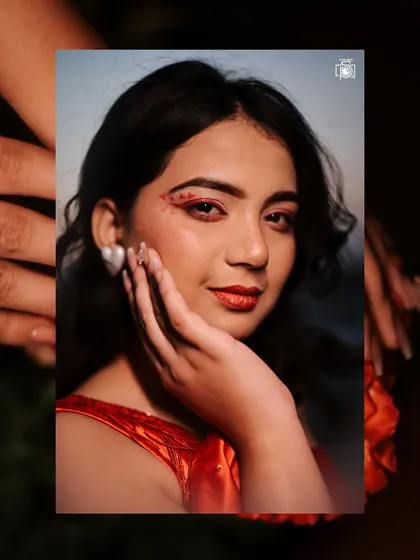 This creatively framed portrait gives a glimpse of the model's expression and makeup. It’s an artistic composition that adds variety to a fashion or beauty series.