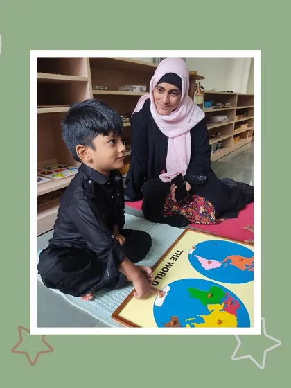 Aihaan proudly points out the continents on the world map for his mother. Our geography materials empower children to understand their place in the world from a very young age.