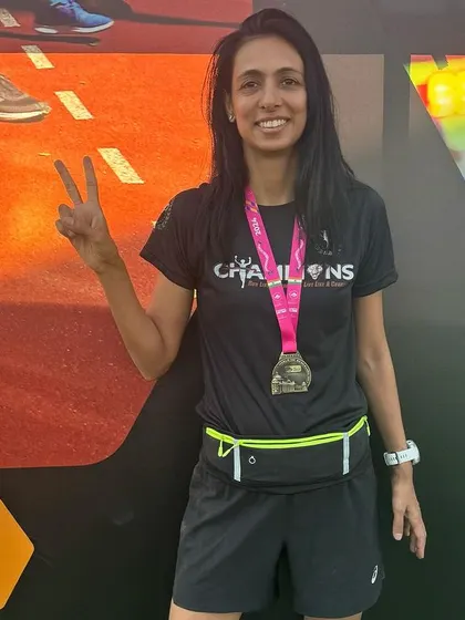 A proud finisher with her medal. Every medal represents a journey of hard work, discipline, and perseverance.