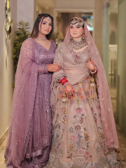 The bride and her sister, a precious moment of family love on the wedding day.