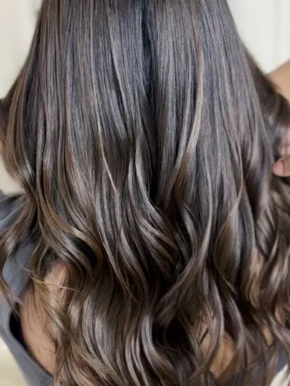 A detailed shot of the hair, showing the fine highlights and glossy finish.