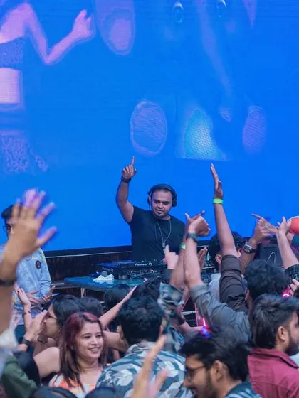 Commanding the stage with a huge LED screen as my backdrop. As a VDJ, I use visuals to tell a story and amplify the emotions of the music, creating a powerful connection with the audience.