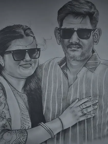 An A3 size couple portrait created with graphite pencils. This was a commission for Raksha Bandhan, designed to be a special gift celebrating a family bond.