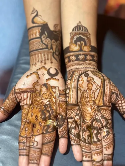 A stunning Karwa Chauth design with intricate figure work.