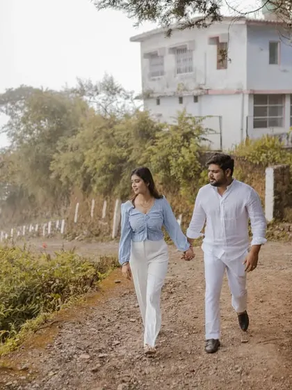 Walking along a rustic path in the hills of Rishikesh. We love capturing couples in their natural element, creating images that feel like a snapshot from a romantic getaway.