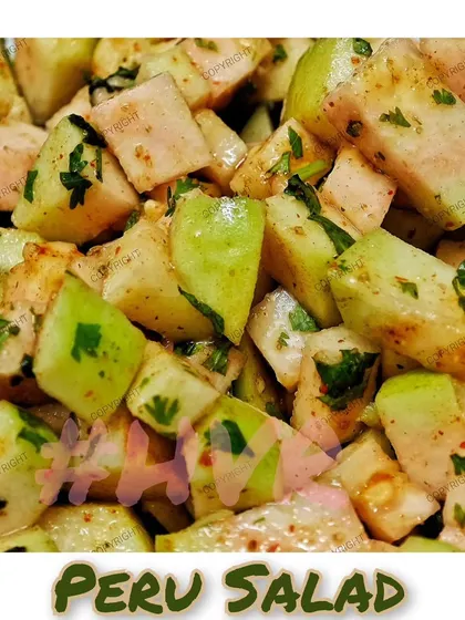 A chatpata Peru Salad made with fresh guava, spices, and herbs. A refreshing and crunchy side dish.