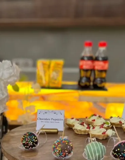 Our dessert station for a kids' party, featuring colorful Chocolate Popsicles and mini Fruit Tarts. These fun and delicious treats are always a huge hit.