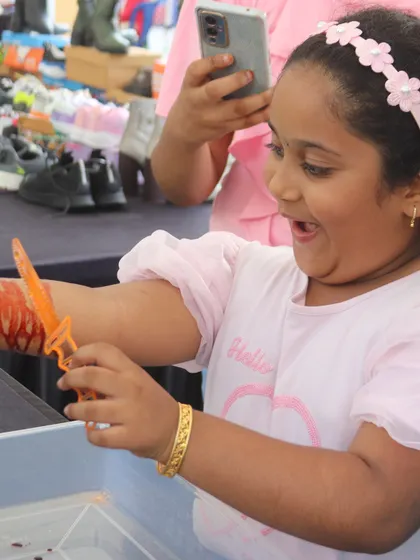The perfect mix of shock and delight! This activity teaches kids about polymers and special effects makeup. It's a hands-on experience that is both educational and a whole lot of fun.
