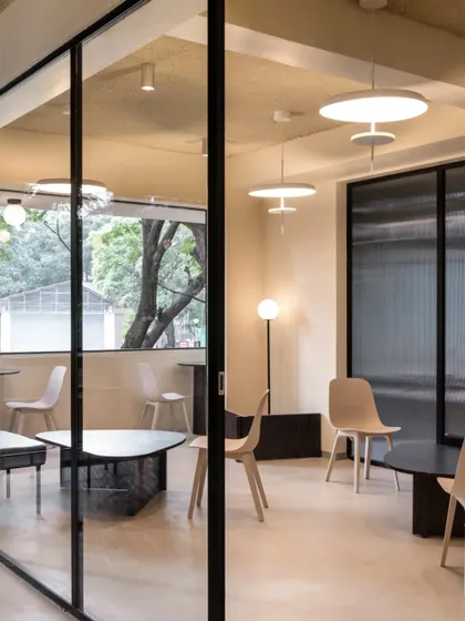 A view through the partition into the lounge, showing how we created distinct zones without completely closing off the space.