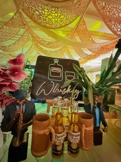 The 'Whiskey' sign and beer display, showcasing our ability to create hybrid stations based on client preferences.