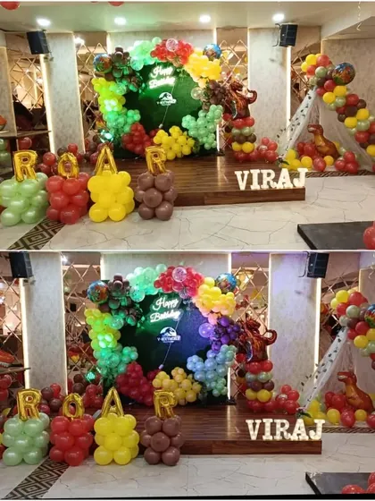 Roar! A prehistoric party with a fun dinosaur theme. This setup includes dinosaur figures, balloon letters spelling "ROAR," and a vibrant balloon backdrop perfect for a young explorer's birthday.