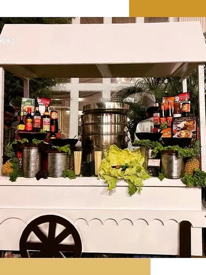 A full view of our charming, cart-style dim sum station, perfect for outdoor events and themed parties.