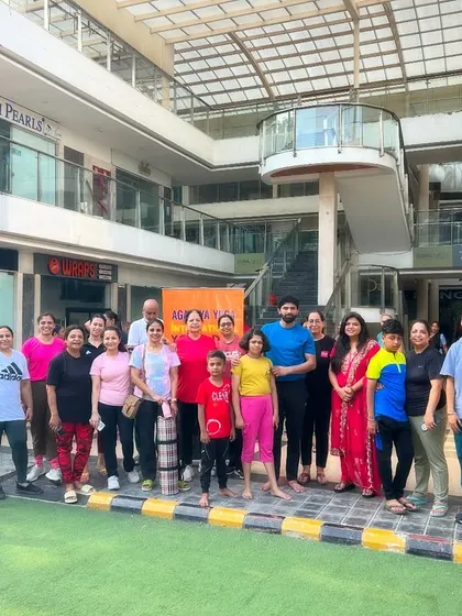 A group of dedicated members, including families and kids, who joined our public yoga workshop. Yoga is for everyone.