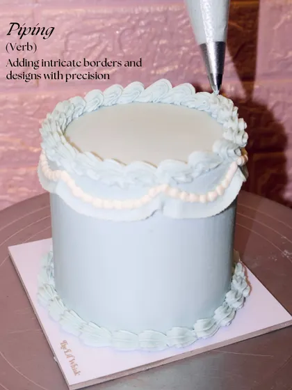 Next step: Piping. Here, we're adding intricate borders and delicate swag details with precision to create that signature vintage look.