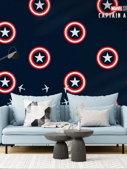 A repeating pattern of Captain America's shield on a dark blue wall creates a classic and cool superhero-themed room.