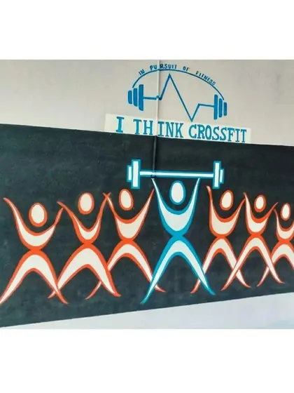 The vibrant colors and dynamic figures in this mural are meant to energize the space and inspire everyone to work together towards their fitness goals.