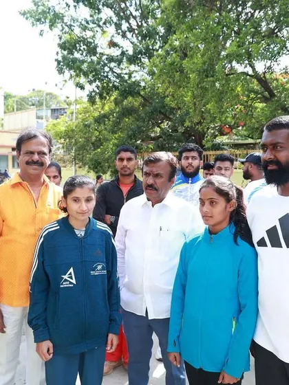 Our athletes and coach with local supporters. We are grateful for the encouragement we receive.