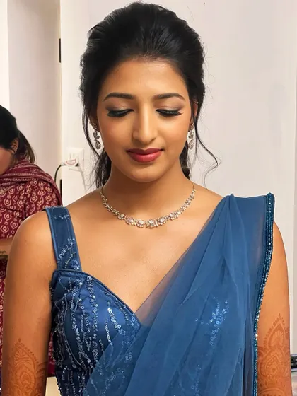 A beautiful, understated glam look. This is perfect for clients who want to look polished and put-together without heavy makeup, a key part of my "less is more" philosophy.