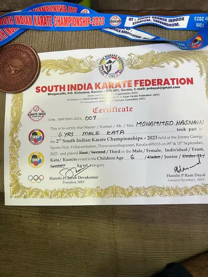 A close-up of the certificate from the South India Karate Federation, official proof of our student's achievement.