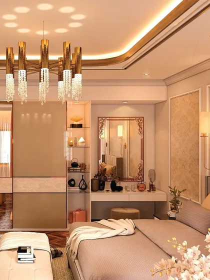 This view shows the dressing area integrated with the sliding wardrobe. The lacquered glass and mirror finish opens up the space, while the open shelving is perfect for displaying personal items.