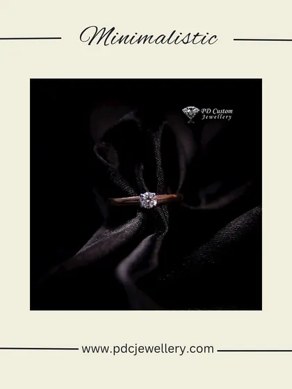 A minimalist solitaire ring set in 18kt hallmarked gold. This piece is the epitome of understated elegance, perfect for someone who loves classic, simple jewellery.