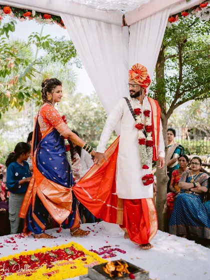 The Saptapadi, or seven steps, a pivotal ritual in a Hindu wedding, captured at Vaibhav and Pooja's ceremony.