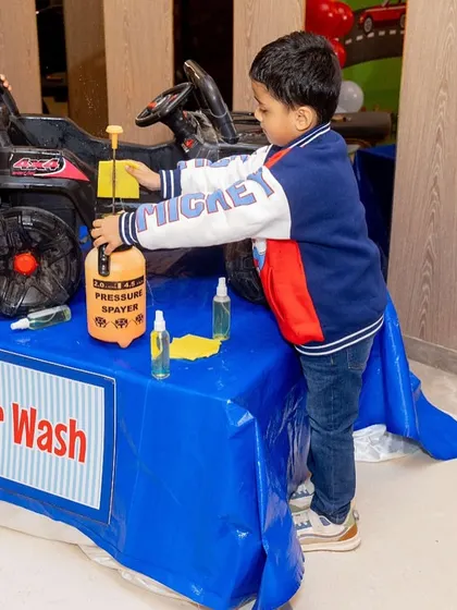 A car wash station for toy cars was a huge hit at this travel-themed birthday party.