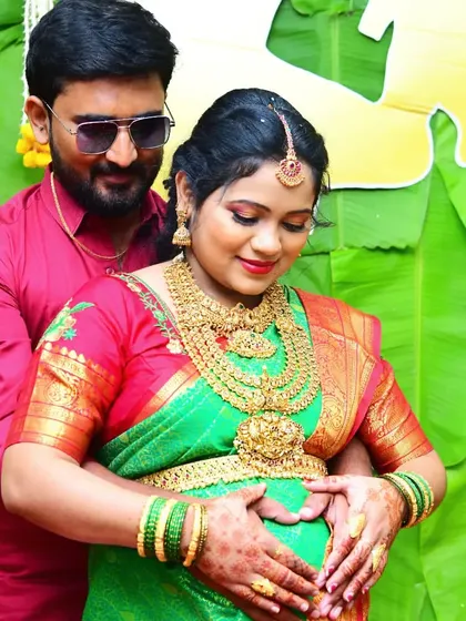 A beautiful maternity shoot featuring one of my traditional temple jewellery sets. The green and red saree is perfectly complemented by the antique gold finish.