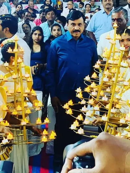 A memorable frame with Indian industrialist and politician, Sir G. Janardhana Reddy, at an event in Bellary, with our Diya dancers creating a beautiful backdrop.