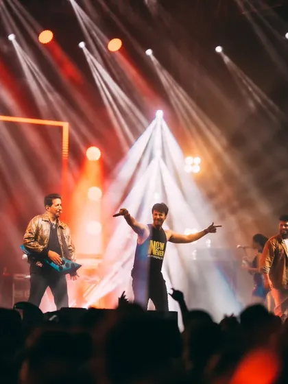 The full band on stage during the Salim-Sulaiman concert at ISB, showcasing the scale of the live music experience we deliver.