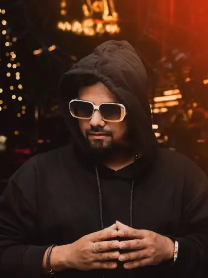 A moody, atmospheric shot in a hoodie. Frequencies don't lie, and neither does style.