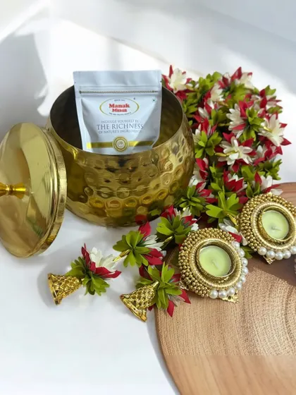 My best-selling Diwali Handi hamper is both beautiful and practical. It includes a hammered metal handi, festive door hangings, premium dry fruits, and a handmade diya for pooja.