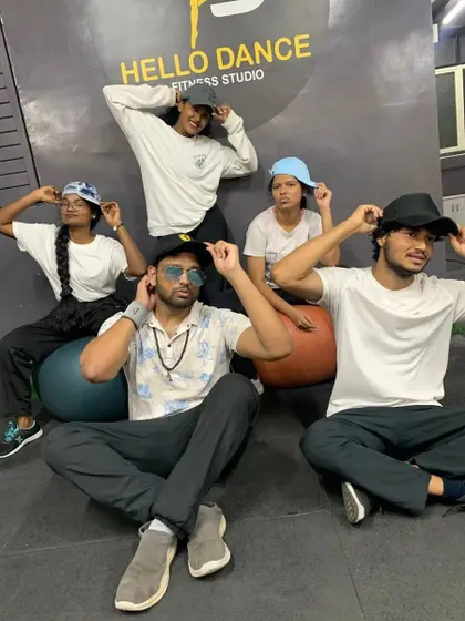 Posing with caps and having a laugh. We are a team that knows how to have a good time together.
