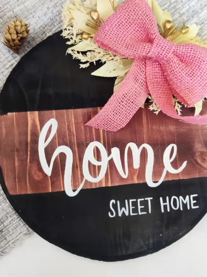 The "Home Sweet Home" sign, perfect for adding a touch of warmth and personality to your living space.